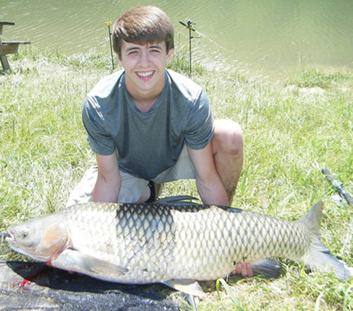 Wyatt Cantrell set a new Wild Carp Club record for largest fish at a club event with his 61 lb, 9 oz grass carp caught during session 5 of the 2013 season of the Wild Carp Club of the Virginias Wyatt Cantrell set a new Wild Carp Club record for largest fish at a club event with his 61 lb, 9 oz grass carp caught during session 5 of the 2013 season of the Wild Carp Club of the Virginias