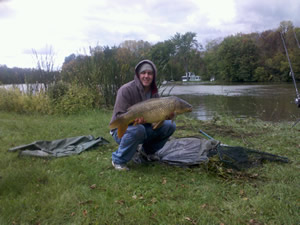 Josh Carnright with a 19 lb, 8 oz Common during Session 5 of Wild Carp Club